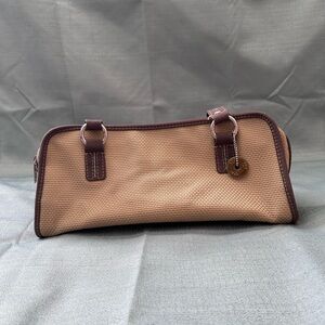 The Sak Tan and Brown Woven Handbag.